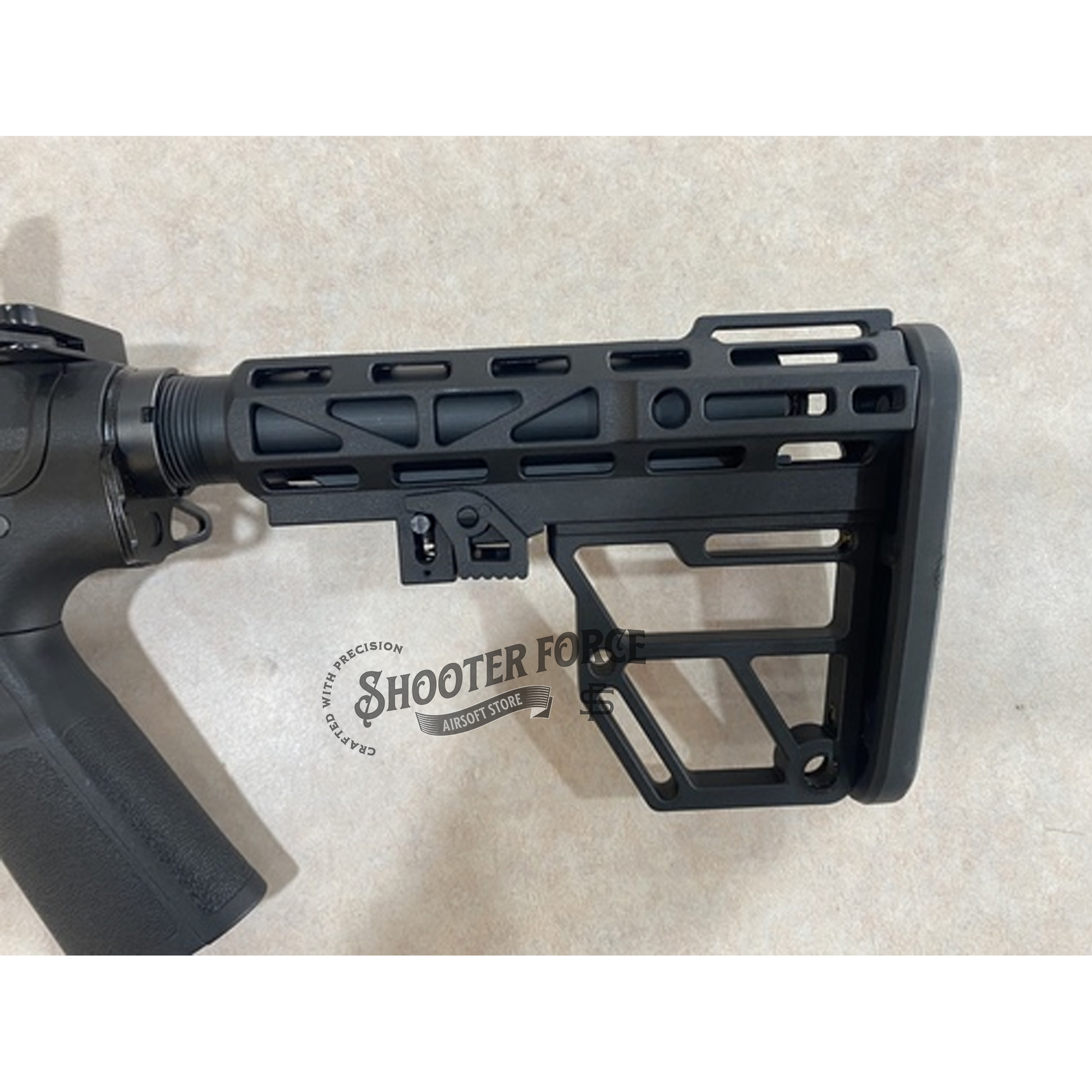 Super Lightweight Skeletonized Aluminum Mil-Spec Buttstock for airsoft rifles, featuring M-LOK slots and QD sling mounts – available at ShooterForce.